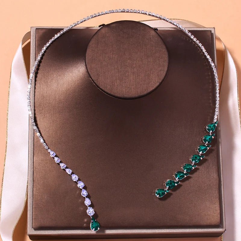 Luna Set... A design that touches imagination, and emerald stones whisper your telegram to everyone who sees you.