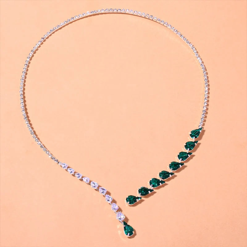 Luna Set... A design that touches imagination, and emerald stones whisper your telegram to everyone who sees you.